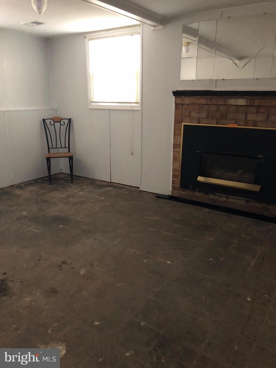 13100 Claxton Drive Laurel, MD 20708 - Photo 20 of 20 Lover lever Room- Needs flooring