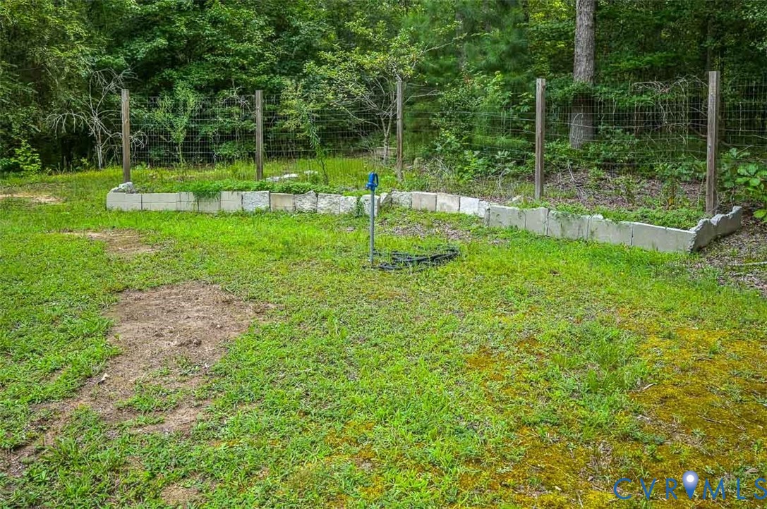 6040 Hare Road Henrico, VA 23231 - Photo 50 of 54 Raised garden bed with concrete block retaining wa