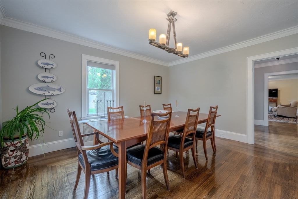 7 Argyle Street Worcester, MA 01609 - Photo 17 of 41 a view of a dining room with furniture wooden floor and chandelier