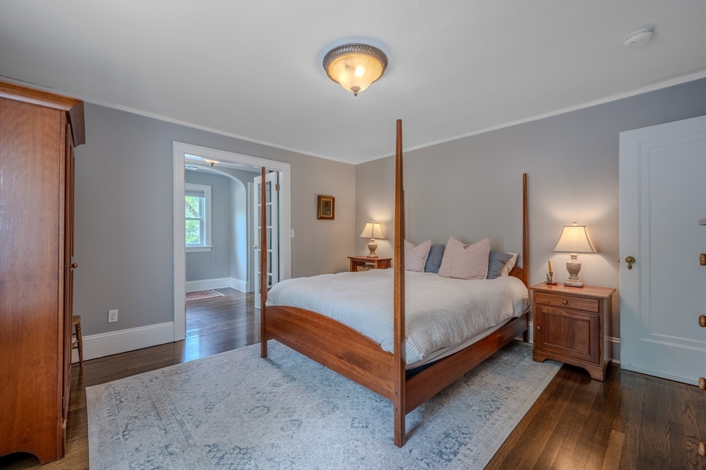 7 Argyle Street Worcester, MA 01609 - Photo 20 of 41 a bed room with a bed and a lamp