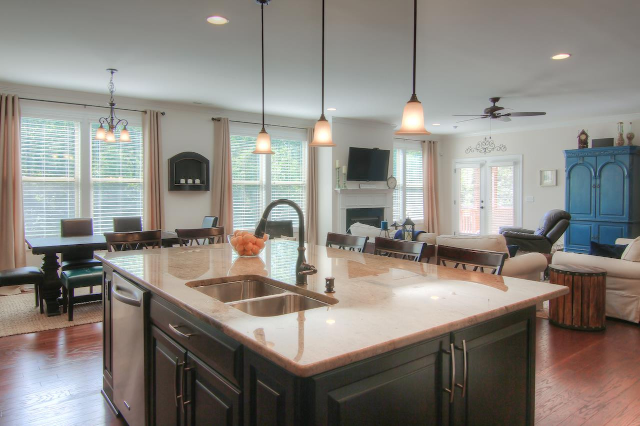 8333 Henderson Road Apex, NC 27539 - Photo 9 of 25 Wonderful open concept first floor - formal dining, kitchen breakfast area and family room - with tons of natural light! Kitchen