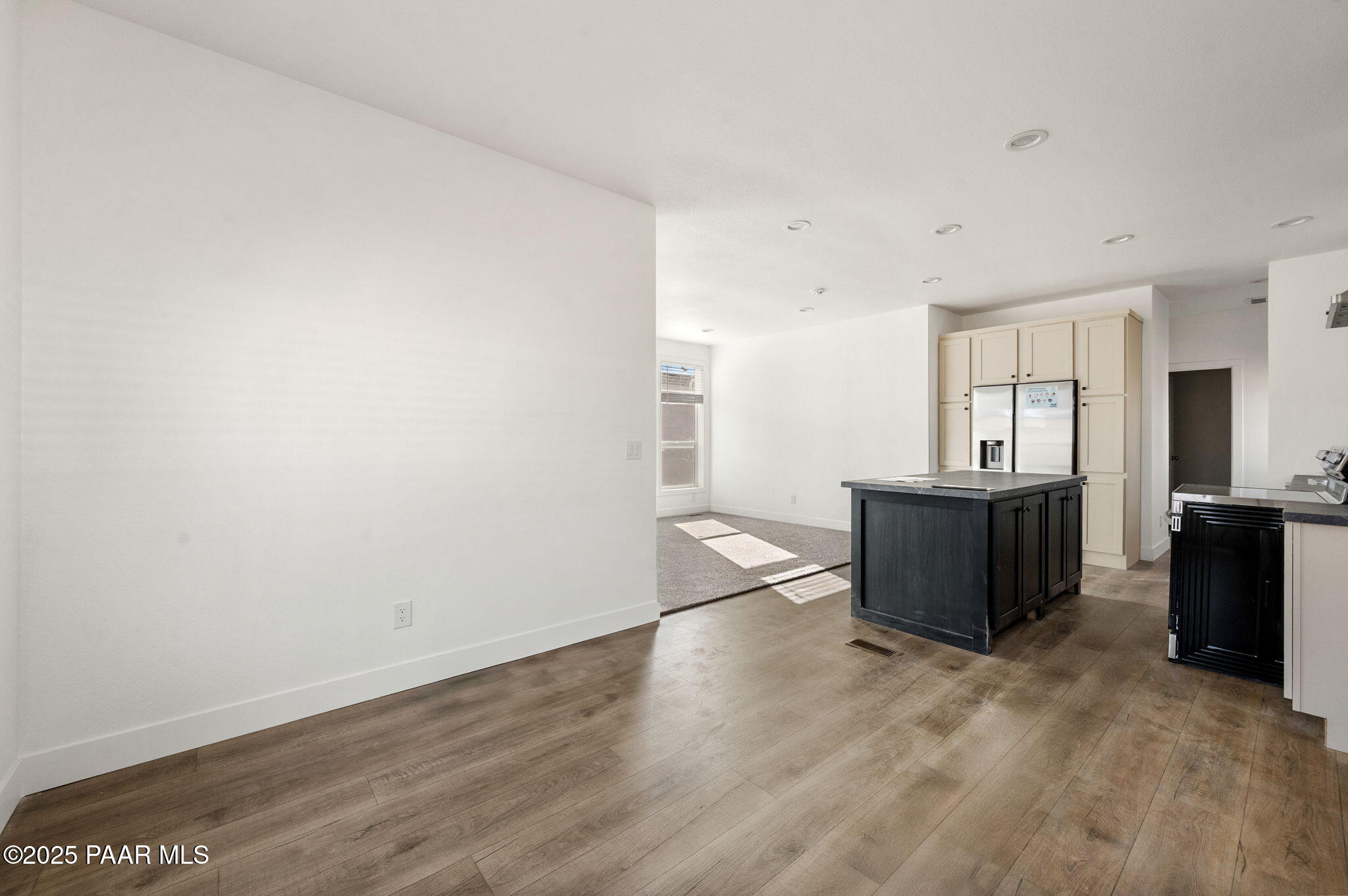 29 East Abra Road Paulden, AZ 86334 - Photo 10 of 22 a view of a room with wooden floor and furniture