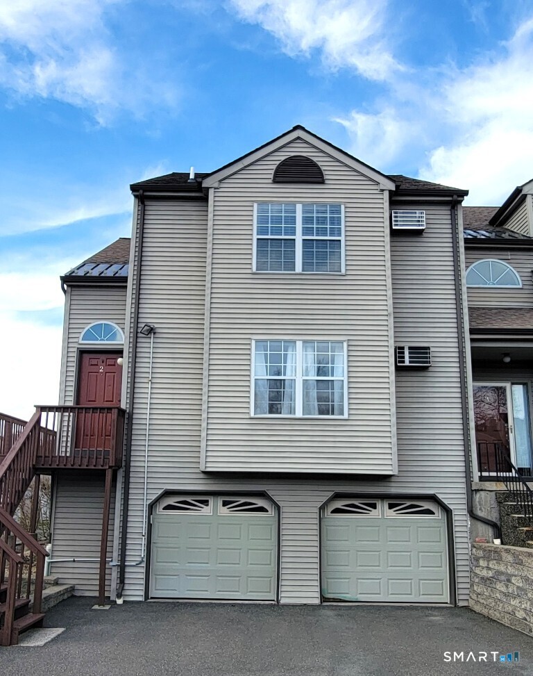 10 Taft Pointe, Unit 2 Waterbury, CT 06708 - Photo 18 of 18 a front view of a house with balcony