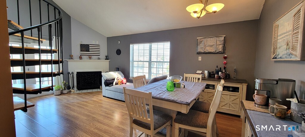 10 Taft Pointe, Unit 2 Waterbury, CT 06708 - Photo 7 of 18 a view of a dining room with furniture window and wooden floor