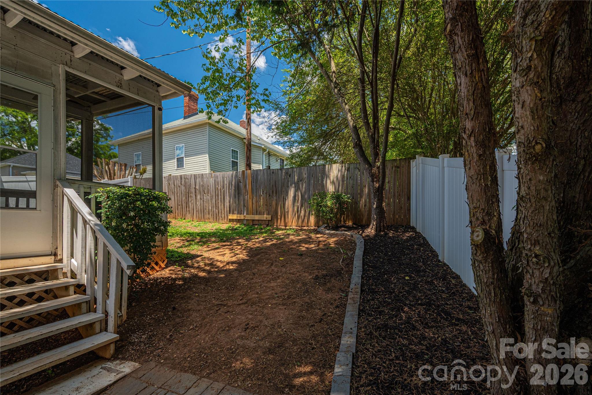 58 Fourth Street Cramerton, NC 28032 - Photo 36 of 44 a view of a house with backyard and garden