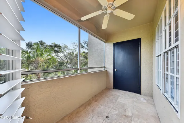 a view of a building from the balcony