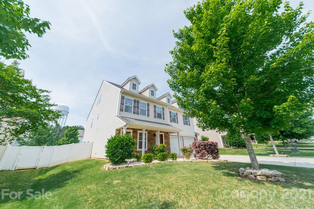 7062 Meyer Road Fort Mill, SC 29715 - Photo 2 of 46 a front view of a house with a yard