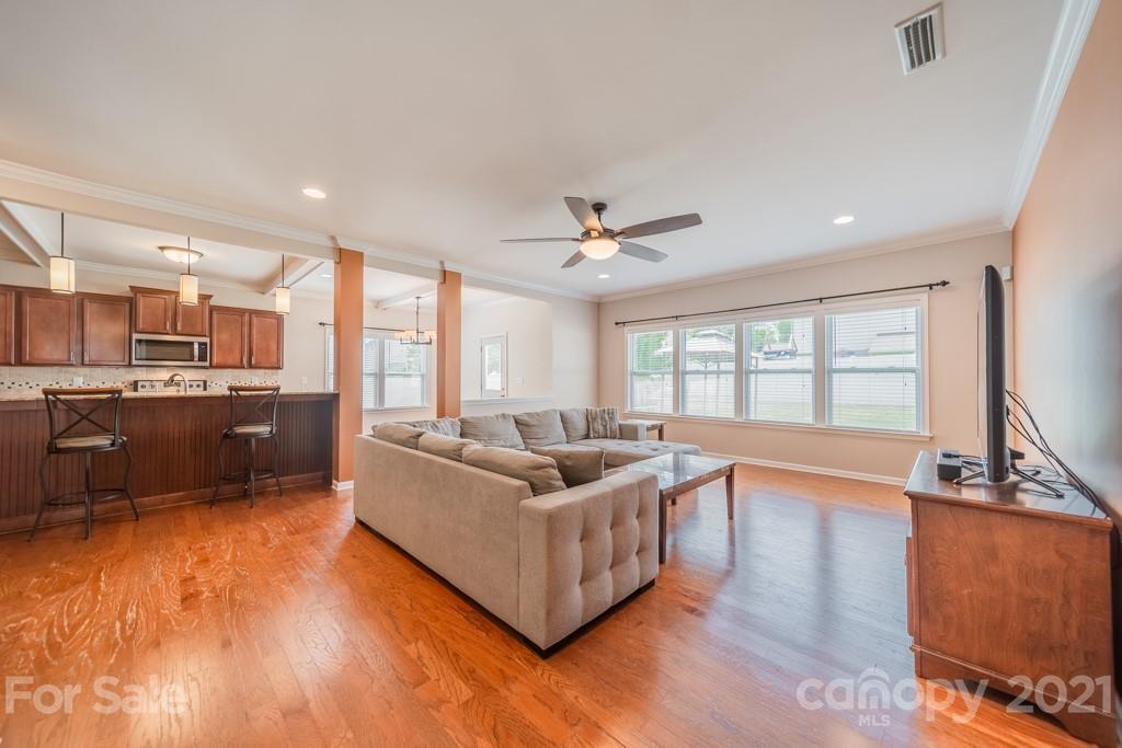 7062 Meyer Road Fort Mill, SC 29715 - Photo 13 of 46 a living room with furniture and a large window