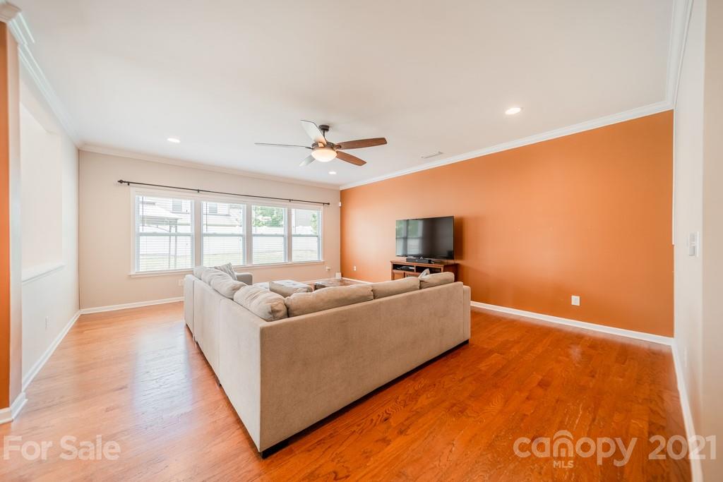 7062 Meyer Road Fort Mill, SC 29715 - Photo 14 of 46 a living room with furniture and a flat screen tv
