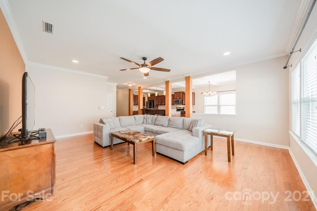 7062 Meyer Road Fort Mill, SC 29715 - Photo 18 of 46 a living room with furniture and a large window
