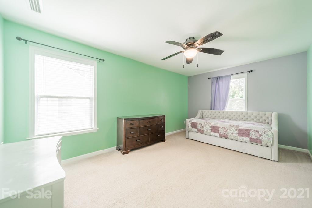 7062 Meyer Road Fort Mill, SC 29715 - Photo 26 of 46 a bedroom with a bed and a window