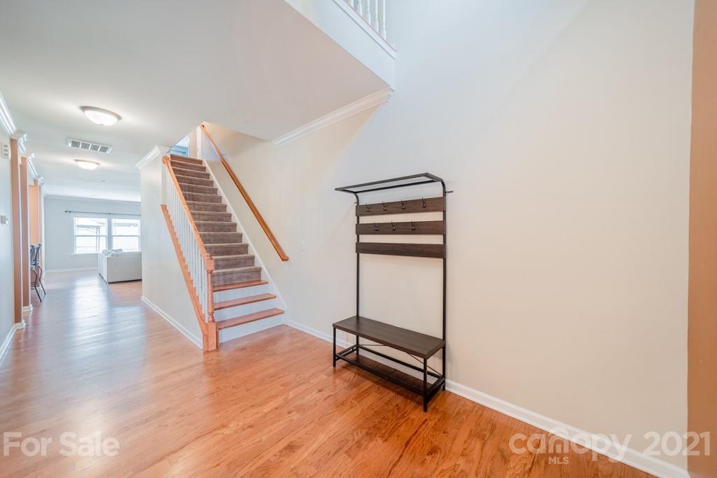7062 Meyer Road Fort Mill, SC 29715 - Photo 5 of 46 a view of entryway with wooden floor