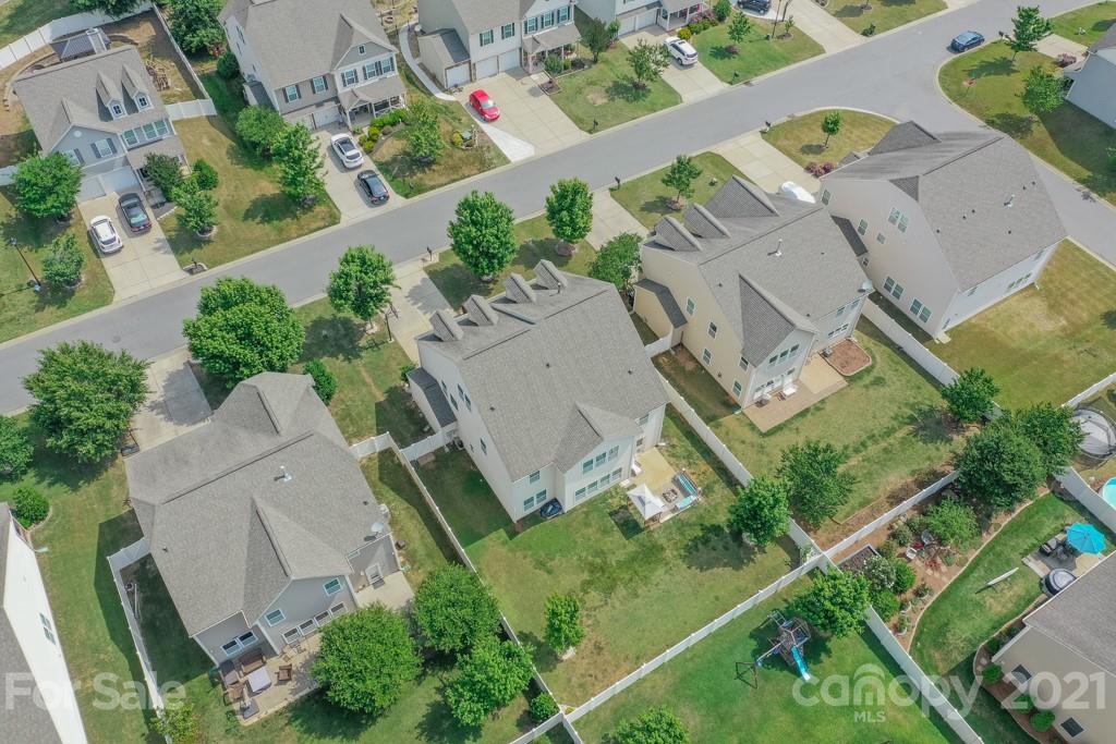 7062 Meyer Road Fort Mill, SC 29715 - Photo 42 of 46 an aerial view of multiple houses with yard