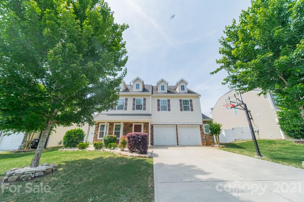 7062 Meyer Road Fort Mill, SC 29715 - Photo 45 of 46 a front view of a house with a yard