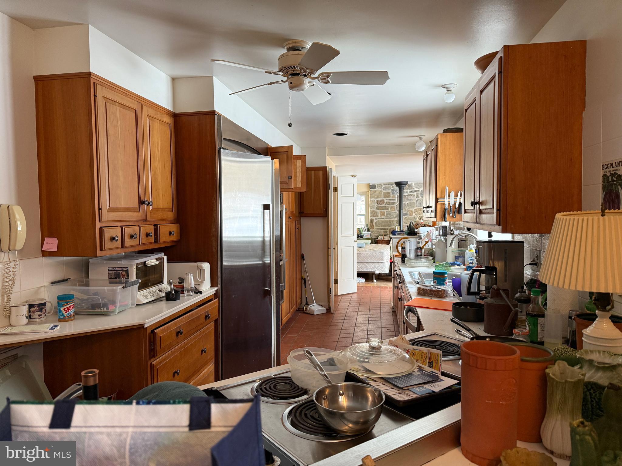 315 Keithwood Road Wynnewood, PA 19096 - Photo 13 of 27 a room with stainless steel appliances kitchen island granite countertop furniture and a large window