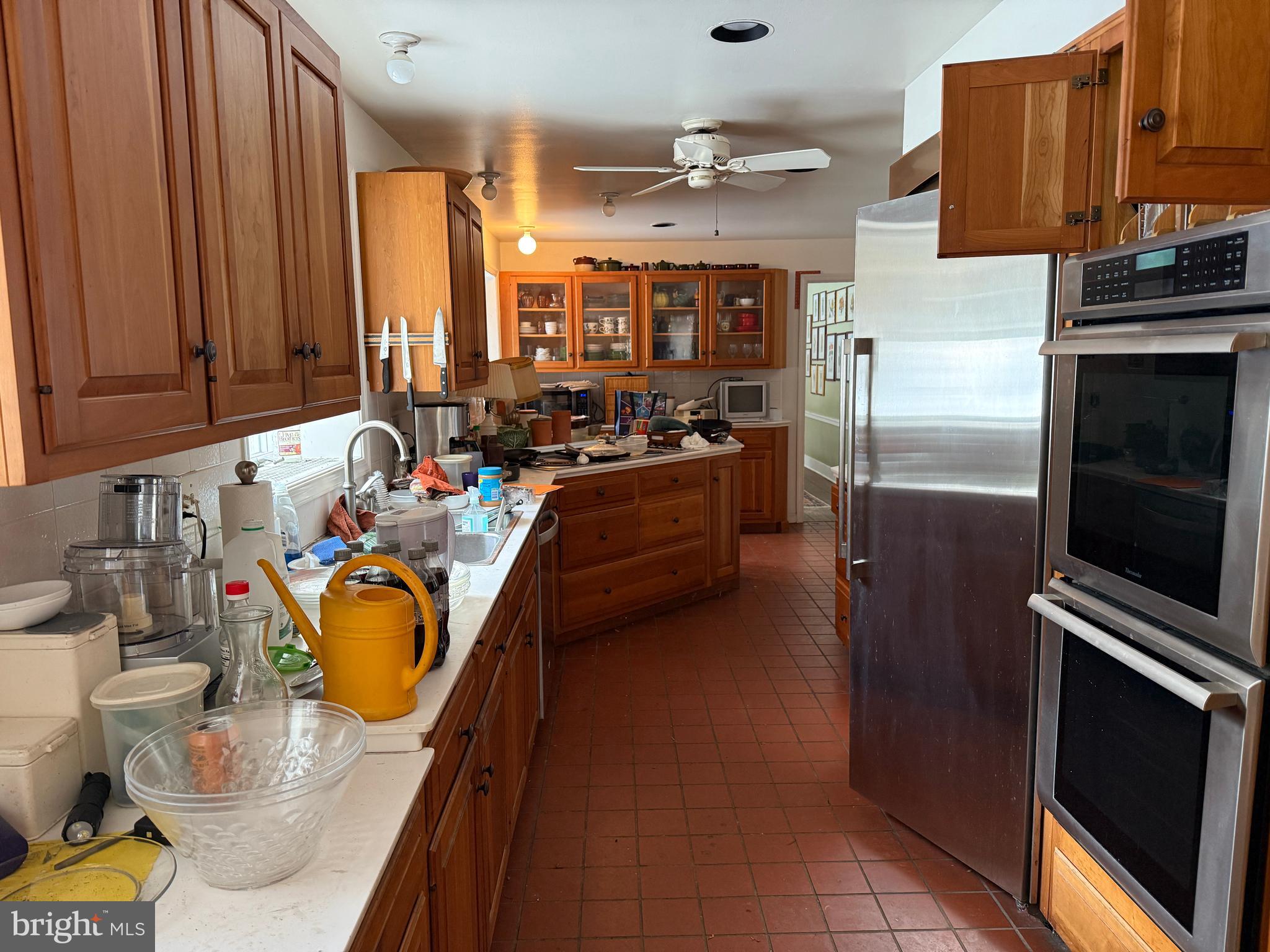 315 Keithwood Road Wynnewood, PA 19096 - Photo 14 of 27 a kitchen with sink refrigerator and cabinets