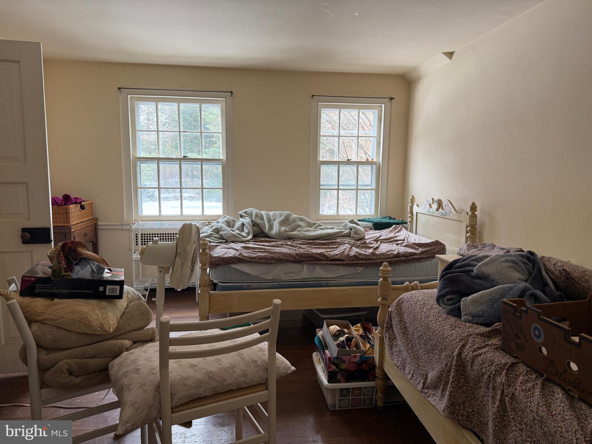 315 Keithwood Road Wynnewood, PA 19096 - Photo 24 of 27 a living room with a bed and a dresser next to a window