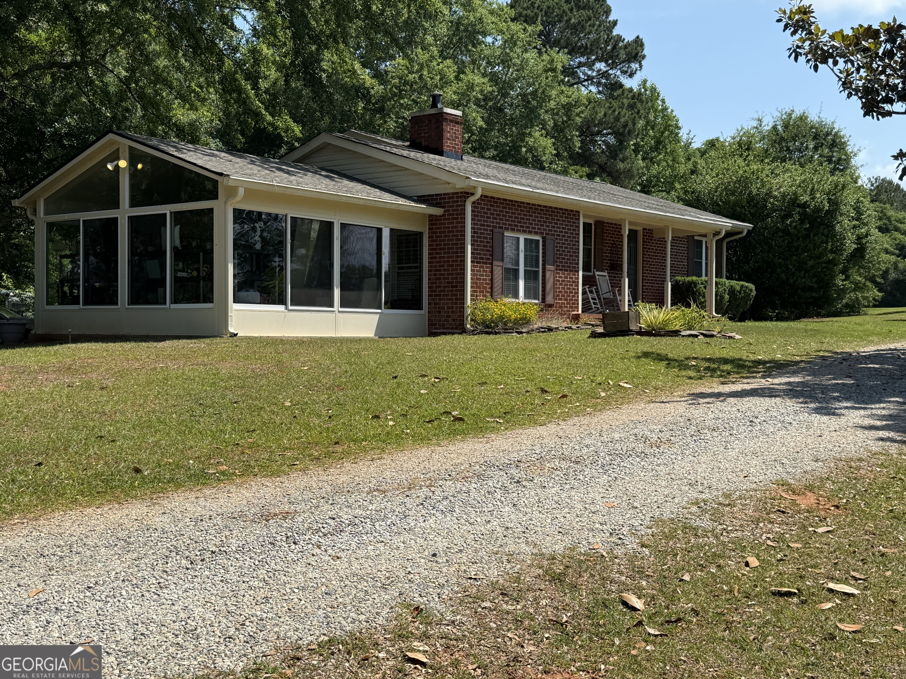 1591 Waymanville Road Thomaston, GA 30286 - Photo 1 of 24 a front view of a house with a yard