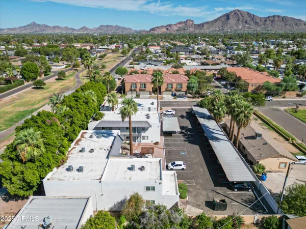 an aerial view of residential house with outdoor space