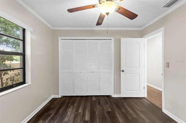 a view of a living room and a floor to ceiling window