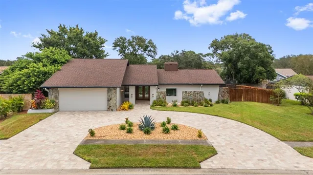 a house view with a garden space