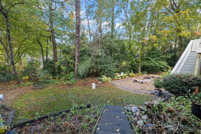 a view of backyard with green space