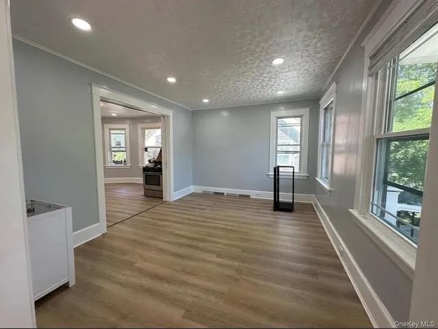 a bathroom with a toilet sink and shower