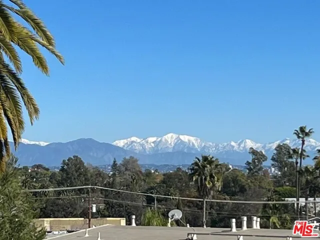 a view of a city and a mountain view