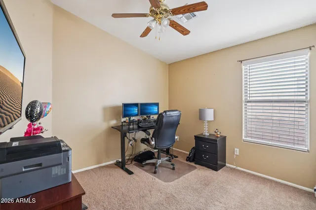 a bedroom with a bed and a cabinets