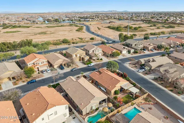 an aerial view of a houses with outdoor space