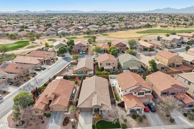 an aerial view of residential building with outdoor space