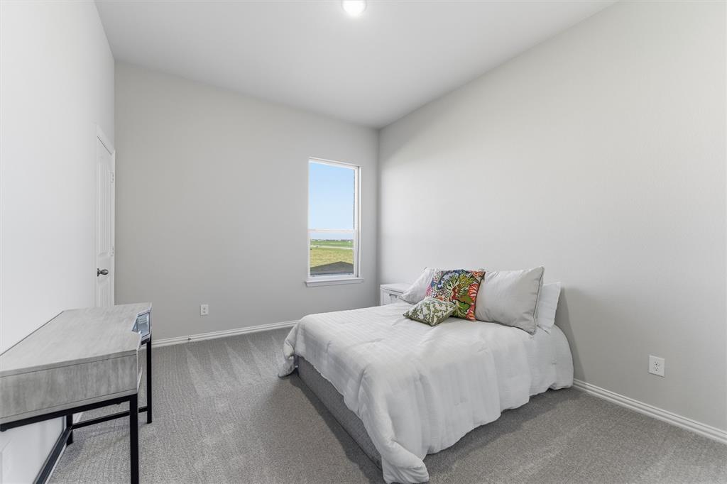 2050 County Road 200 Valley View, TX 76272 - Photo 20 of 31 Bedroom featuring carpet floors