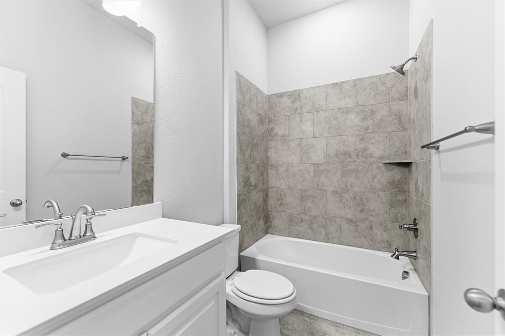 2050 County Road 200 Valley View, TX 76272 - Photo 22 of 31 Bathroom featuring shower / bathtub combination and vanity