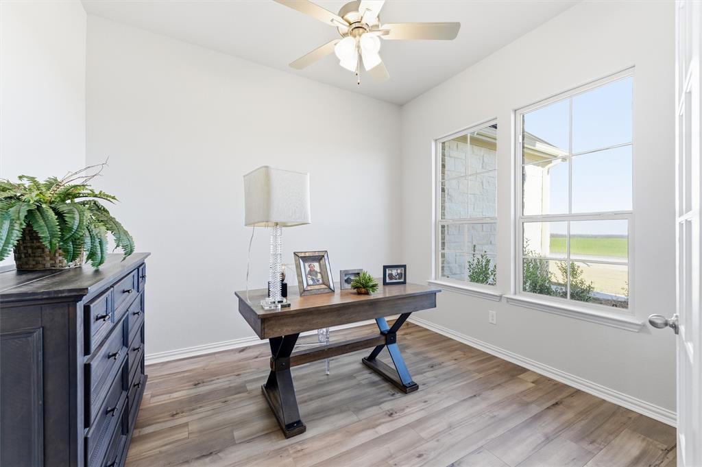 2050 County Road 200 Valley View, TX 76272 - Photo 8 of 31 Office with light wood-style floors and ceiling fan