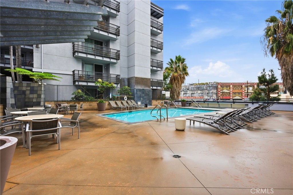 629 Traction Avenue, Unit 257 Los Angeles, CA 90013 - Photo 24 of 38 a view of a swimming pool with outdoor seating