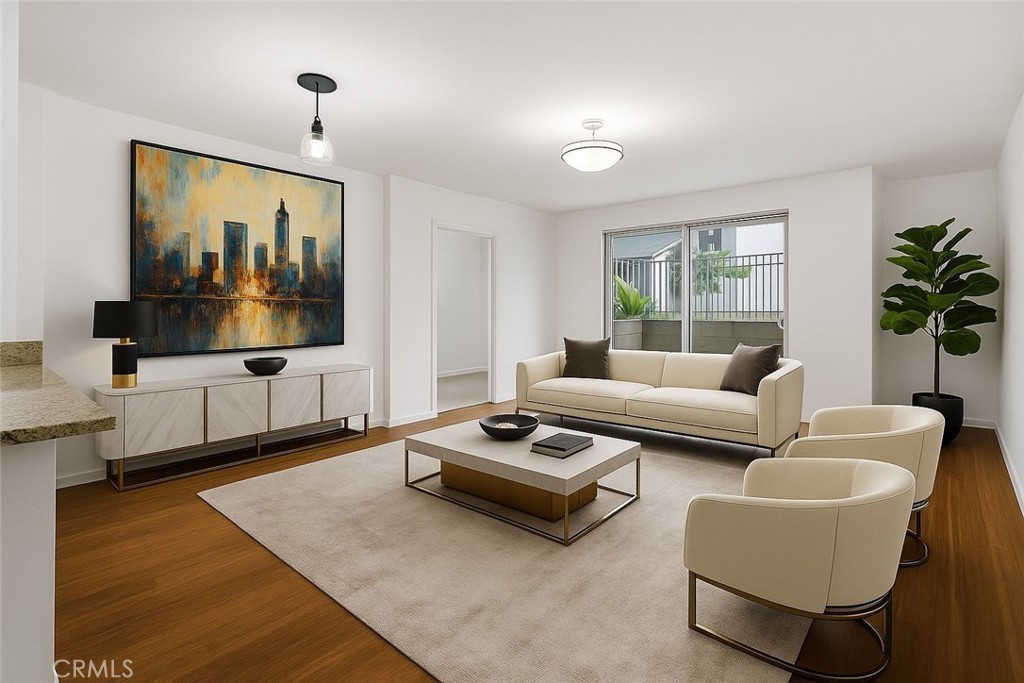 629 Traction Avenue, Unit 257 Los Angeles, CA 90013 - Photo 4 of 38 a living room with furniture and a flat screen tv