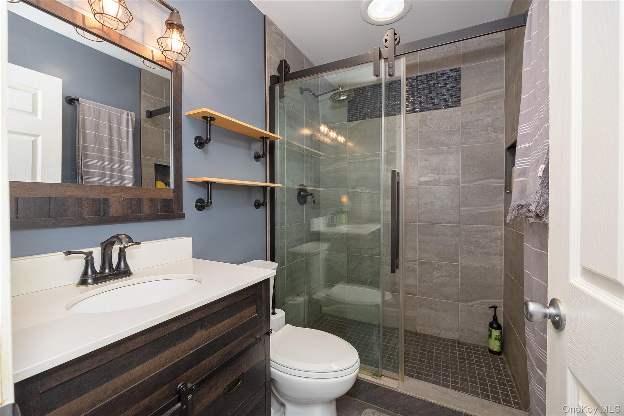 164 Bohl Road Hopewell Junction, NY 12533 - Photo 21 of 30 a bathroom with a sink toilet and shower