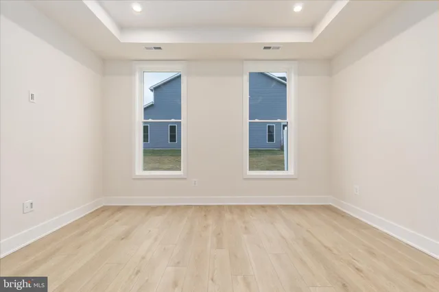 an empty room with a natural light