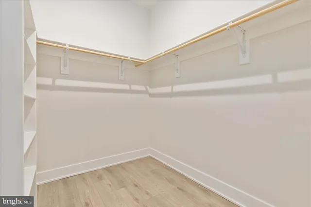 a view of staircase with white walls