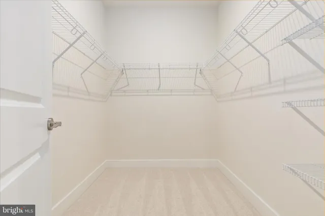 a bathroom with a double vanity sink mirror and