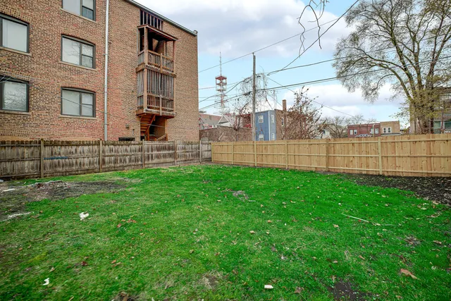 a view of a backyard with a garden
