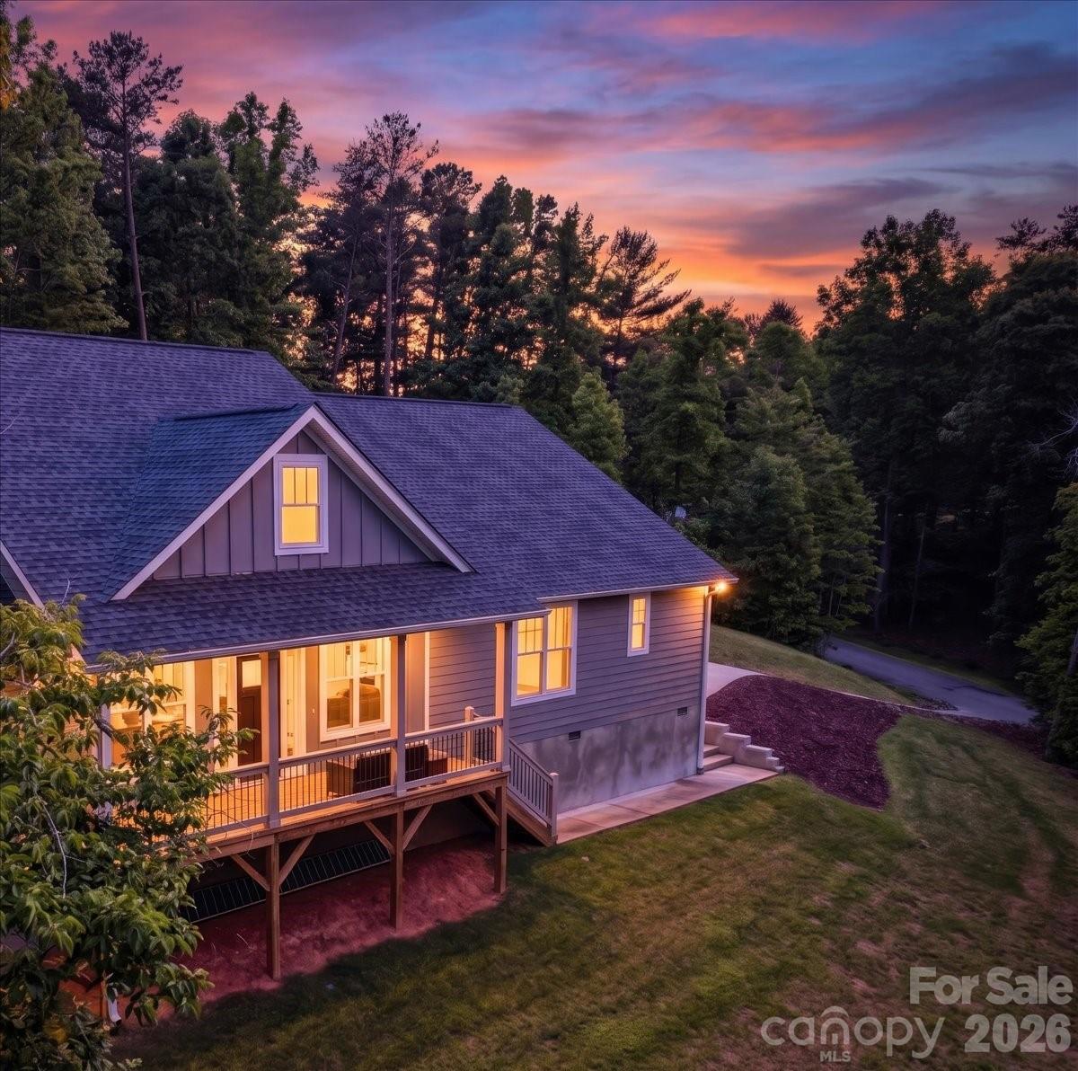 36 Cherry Ridge Lane Weaverville, NC 28787 - Photo 37 of 37 a view of a house with backyard porch and sitting area