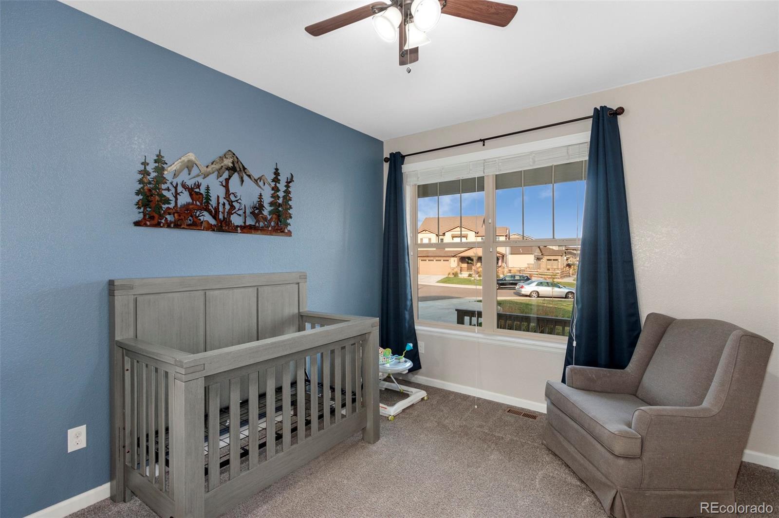 8875 Flattop Way Arvada, CO 80007 - Photo 13 of 38 a bedroom with furniture and window