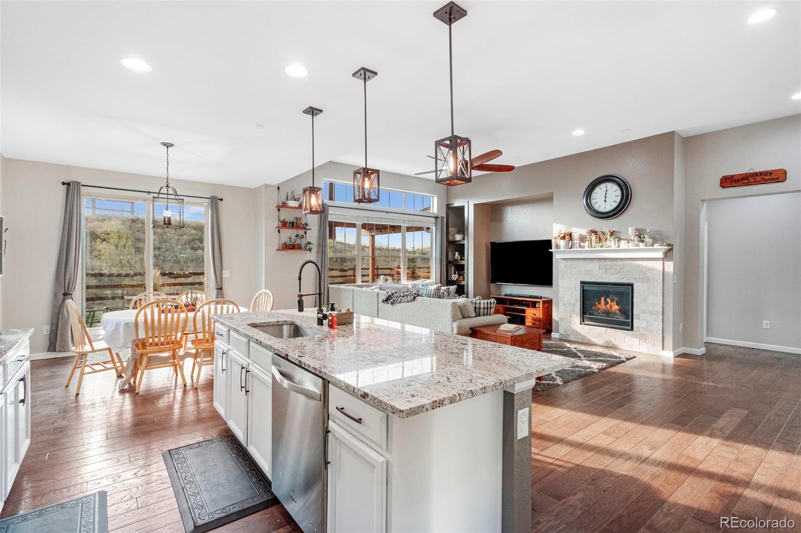 8875 Flattop Way Arvada, CO 80007 - Photo 2 of 38 a very nice looking dining room with a large window