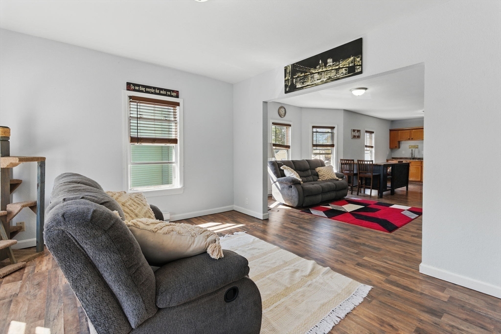 166-168 Corthell Street Springfield, MA 01151 - Photo 16 of 33 a bedroom with furniture and a window