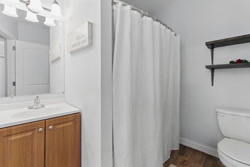 166-168 Corthell Street Springfield, MA 01151 - Photo 24 of 33 a bathroom with a sink a toilet and shower