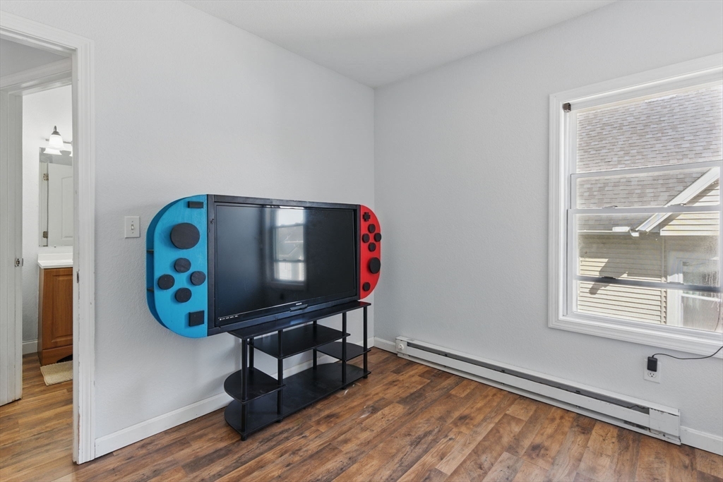 166-168 Corthell Street Springfield, MA 01151 - Photo 25 of 33 a view of workspace with wooden floor windows