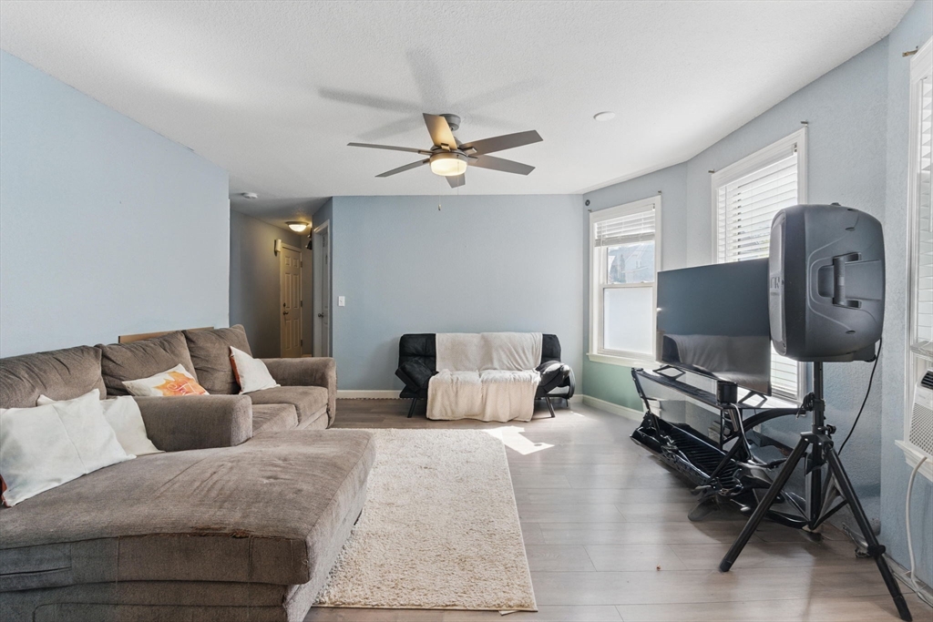166-168 Corthell Street Springfield, MA 01151 - Photo 5 of 33 a living room with furniture