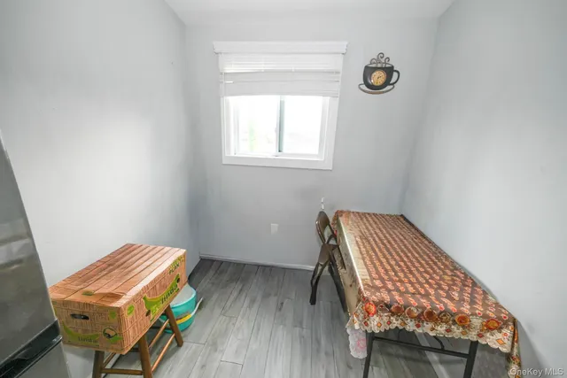 a room with a bed and a window