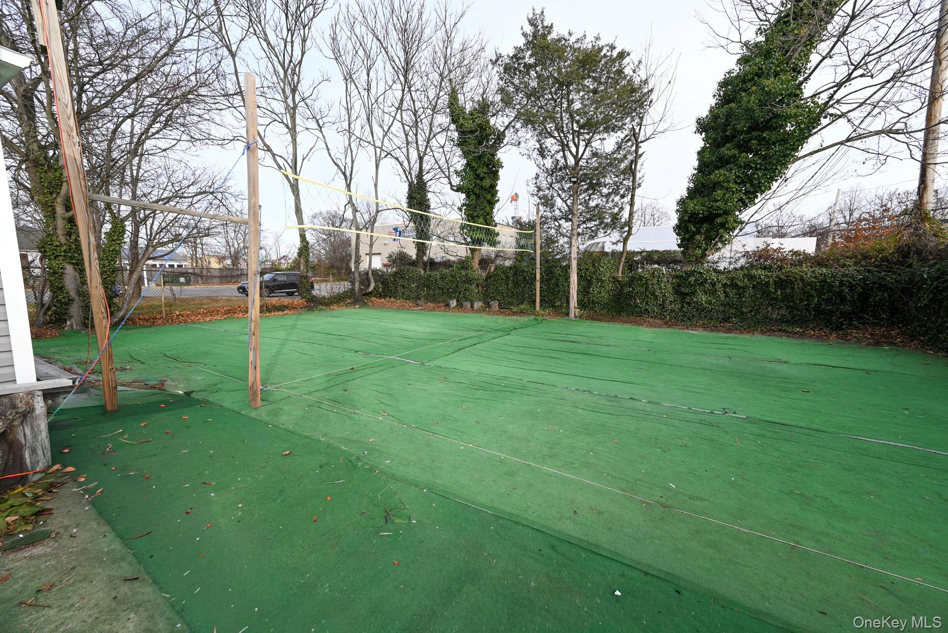 45 Rider Avenue Patchogue, NY 11772 - Photo 25 of 29 a view of a grassy field with trees around